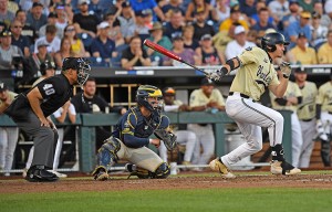 JJ Bleday #51 of the Vanderbilt Commodores singles in a run in the fourth inning against the Michigan Wolverines during game three of the College World Series Championship Series on June 26, 2019 at TD Ameritrade Park Omaha in Omaha, Nebraska.  Credit: © Peter Aiken, Getty Images