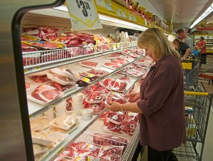 Supermarkets, such as the one in this photo, offer consumers a huge variety of foods. Supermarkets typically stock foods they purchase from wholesalers. Credit: © Tony Hertz, Alamy Images 