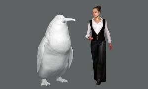 An illustration shows the approximate height of a giant penguin next to a woman. Credit: © Canterbury Museum