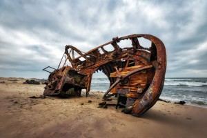 Ship Wreck along the Skeleton Coast in Western Namibia. Credit: © Lukas Bischoff Photograph/Shutterstock