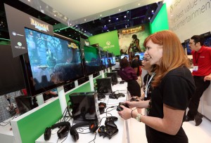 The Xbox One video game console was released by Microsoft in 2013. This photograph shows a woman playing the game Rayman Legends (2013) on an Xbox One. Credit: © Xbox