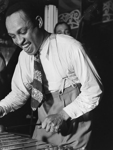 Lionel Hampton, an American jazz musician and band leader, gained recognition for his showmanship while playing the vibraphone. From 1936 to 1940, he recorded regularly with the clarinetist Benny Goodman. Credit: Library of Congress