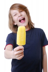 Child enjoying an ice pop Credit: © Shutterstock
