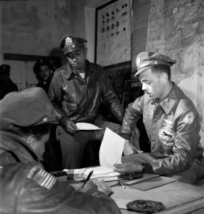 The Tuskegee Airmen were a group of African American pilots, crew, and support staff that served in the Army Air Corps during World War II (1939-1945). This photograph, taken in Ramitelli, Italy, in 1945, shows airmen at a tactical meeting. Credit: Library of Congress 