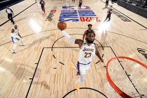 LeBron James of the Los Angeles Lakers dunks the ball during Game Six of the NBA Finals against the Miami Heat on Oct. 11, 2020, at The AdventHealth Arena at ESPN Wide World Of Sports Complex in Orlando, Florida.  Credit: © Andrew D. Bernstein, NBAE/Getty Images 