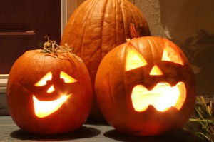 On Halloween, many people decorate their homes with jack-o'-lanterns, hollowed-out pumpkins with a face cut into one side. A candle or other light illuminates the face from within, as seen in this photograph. © V. J. Matthew, Shutterstock