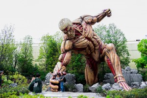 A life-sized model of a Titan greets visitors to a Japanese theme park attraction based on the series Attack on Titan. Credit: © MR. AEKALAK CHIAMCHAROEN/Shutterstock