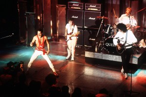 Queen is a British rock band that gained international fame in the 1970's. The original group members were, from left to right, Freddie Mercury, John Deacon, Roger Taylor, and Brian May. This photo shows the group performing at the Montreux Golden Rose Pop Festival in Switzerland. Credit: © Trinity Mirror/Mirrorpix/Alamy Images