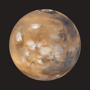 Mars, like Earth, has clouds in its atmosphere and deposits of ice at its poles. But unlike Earth, Mars has little to no liquid water on its surface. The rustlike color of Mars comes from the large amount of iron in the planet's soil. Credit: NASA/JPL/Malin Space Science Systems