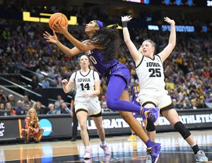 Louisiana State University forward Angel Reese approaches the basket during the 2023 NCAA Women's Basketball National Championship against the University of Iowa on Sunday, April 2, 2023, in Dallas, Texas. Credit: © Ian Halperin, UPI/Alamy Images