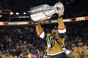Vegas Golden Knights right wing Mark Stone holds the Stanley Cup after defeating the Florida Panthers 9-3 in Game 5 of the National Hockey League Finals on June 13, 2023, in Las Vegas, Nevada. The Knights won the series 4-1.  Credit: © John Locher, AP Photo